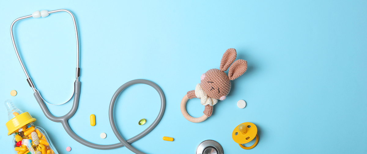pediatrics-concept-stethoscope-toy-light-background.png